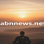 شروق شمس هادئ يرمز للصيام الروحاني في الدين البهائي مع رابط موقع abnnews.net.