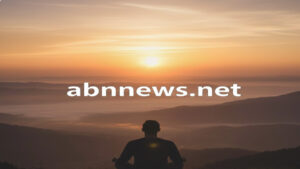 شروق شمس هادئ يرمز للصيام الروحاني في الدين البهائي مع رابط موقع abnnews.net.