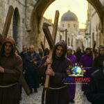 Christian pilgrims carrying wooden crosses during Holy Week procession in Jerusalem, ABN NEWS.