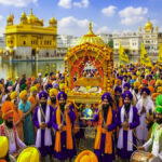 A massive crowd of over 200 million people celebrating the Vaisakhi festival in the vibrant Nagar Kirtan parade in Amritsar, with the 'ABN NEWS' logo visible.