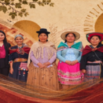 Indigenous Bolivian women discussing education and equality at a Weaving the Future forum