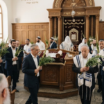 Jewish worshippers observe Hoshana Rabbah during the final day of Sukkot